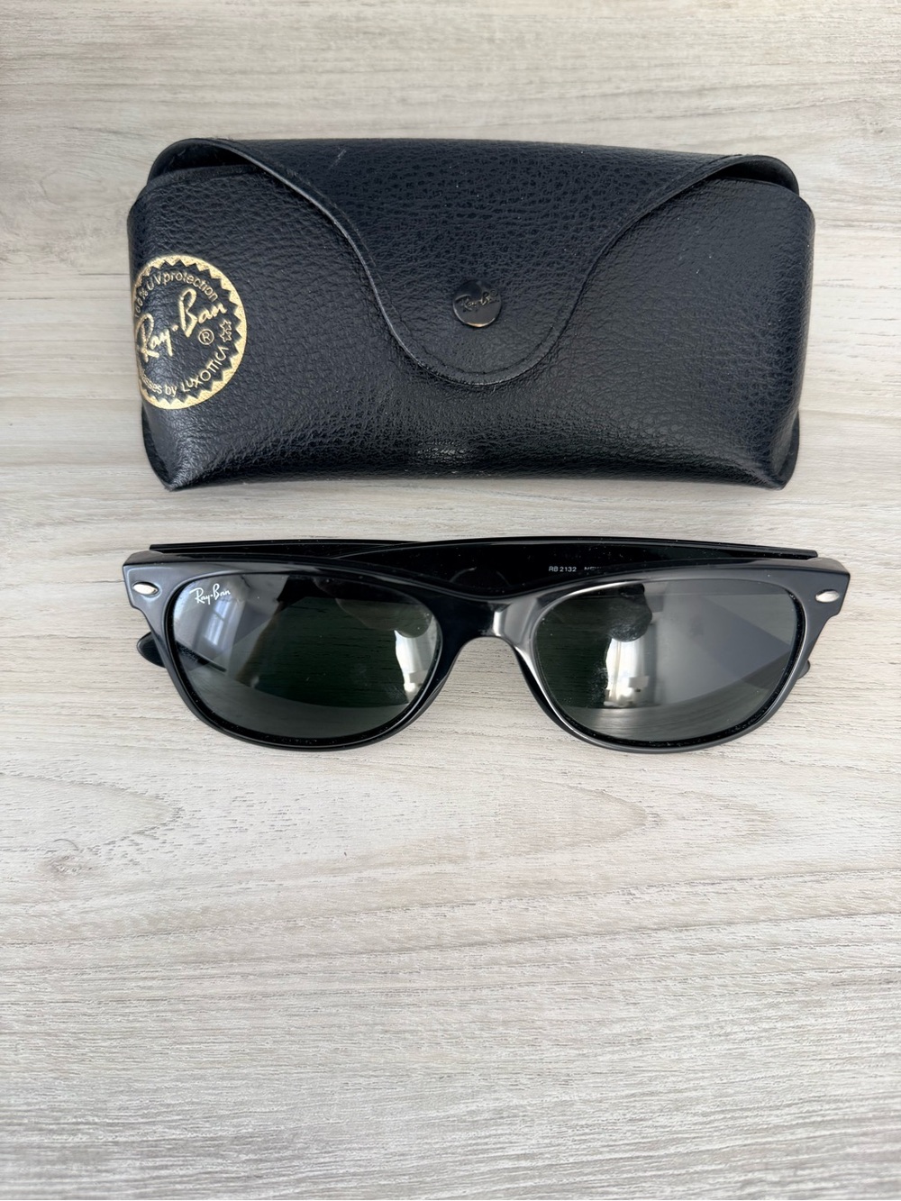 Ray-Ban Black Frame Sunglasses with Green Lenses